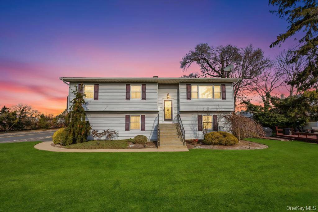 Absolutely beautiful hi ranch with open floor plan, renovated kitchen and second floor bath.