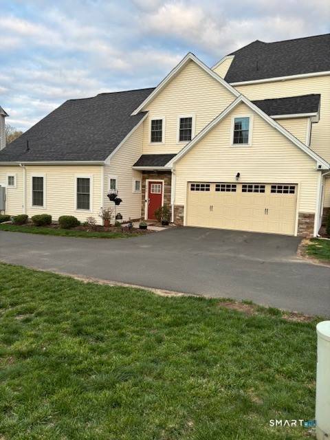 This property is a stunning, rarely available IVES end unit townhouse for sale in the desirable South Windsor Woods community.