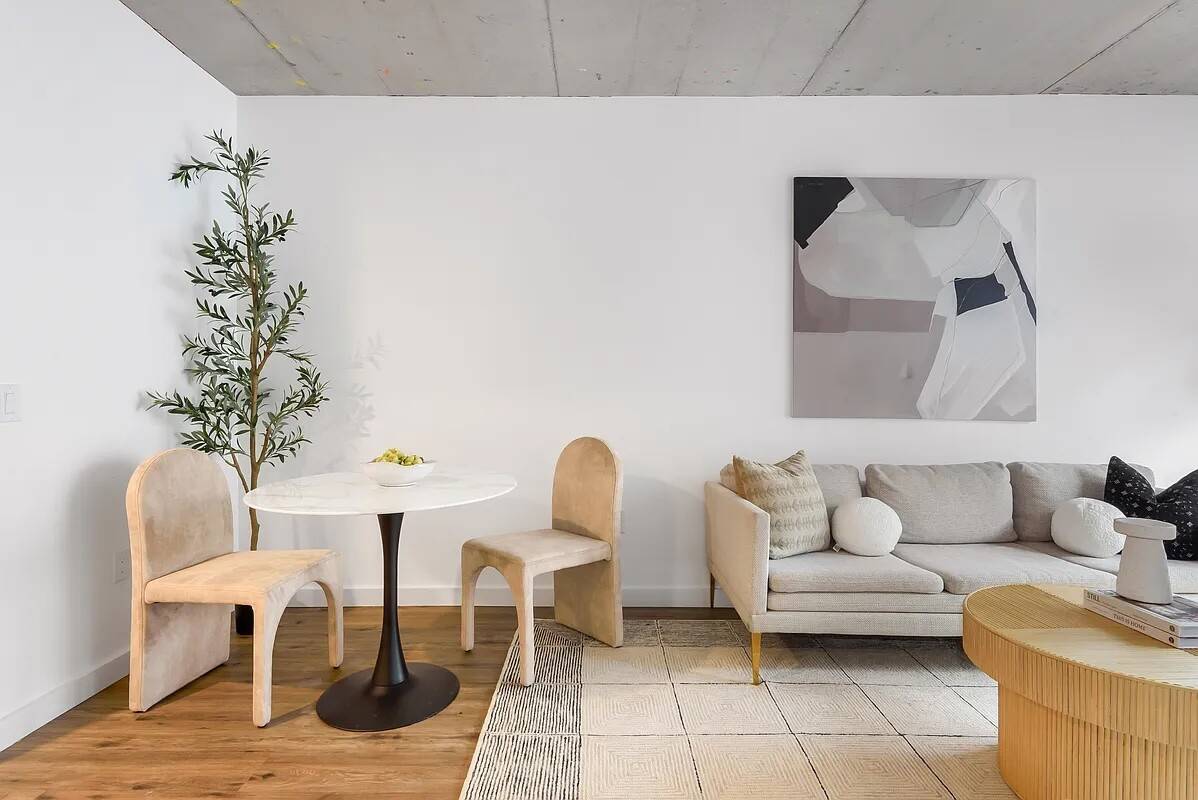 Welcome to Graham on the Park, an extraordinary architectural gem nestled in the heart of prime Greenpoint.