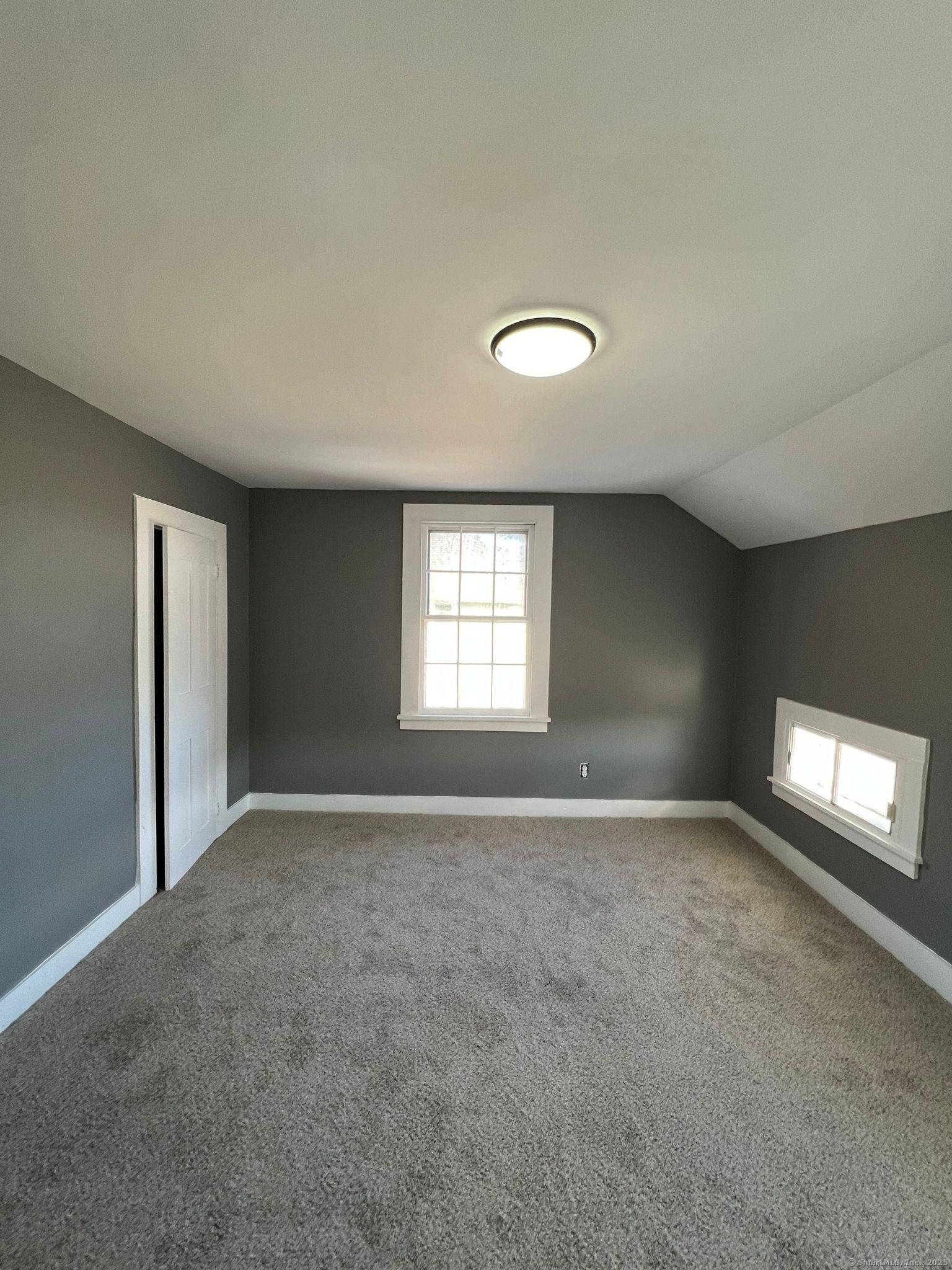 Step into timeless elegance with this beautifully renovated 6 bedroom Colonial home, perfectly situated in a quiet neighborhood with ample outdoor space.
