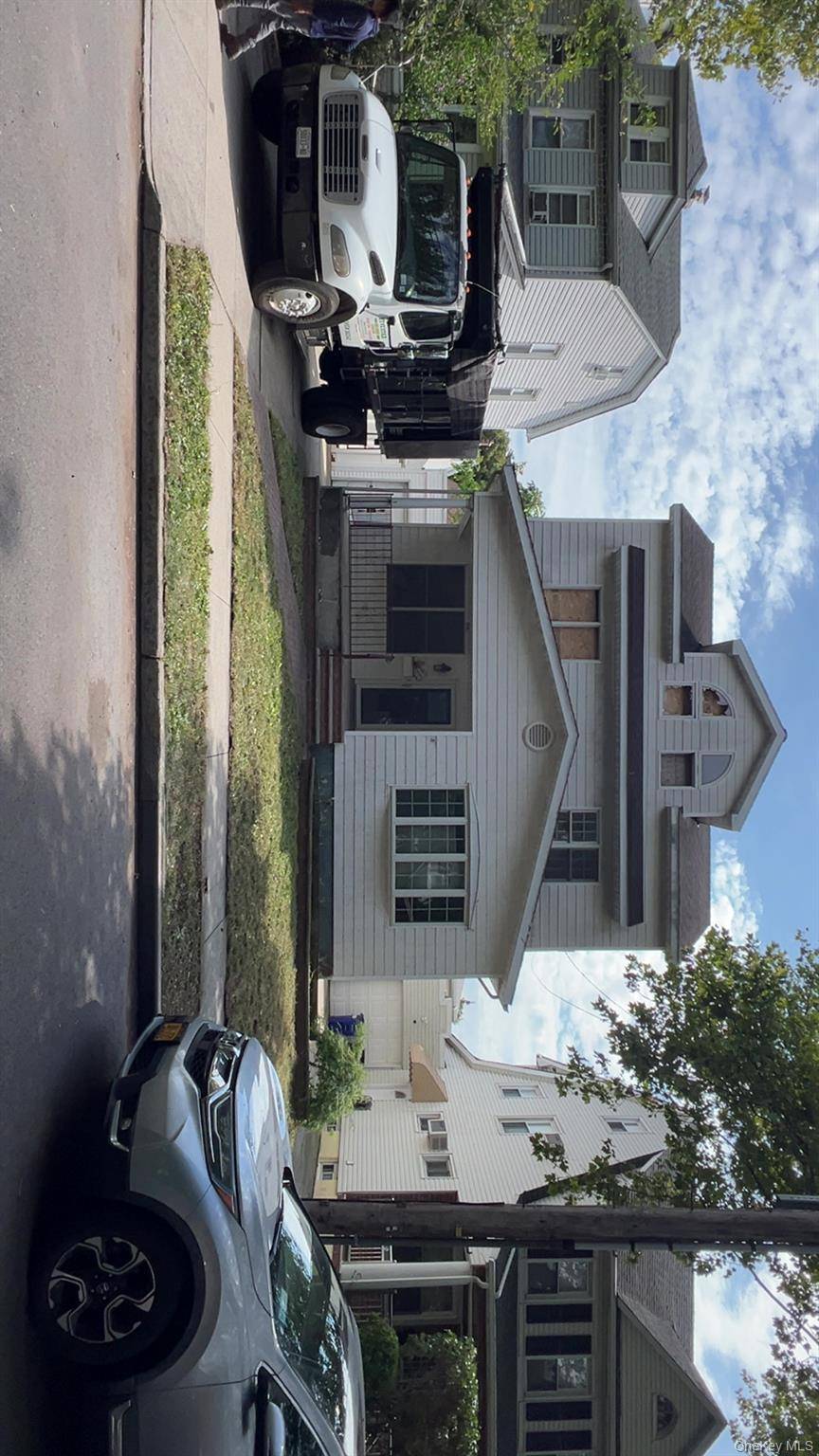 CALLING ALL INVESTORS HOUSE NEEDS A FULL RENOVATION THERE WAS A FIRE IN THE ATTIC FULL BASEMENT WITH SEP OUTSIDE ENTRANCE ZONING R3A