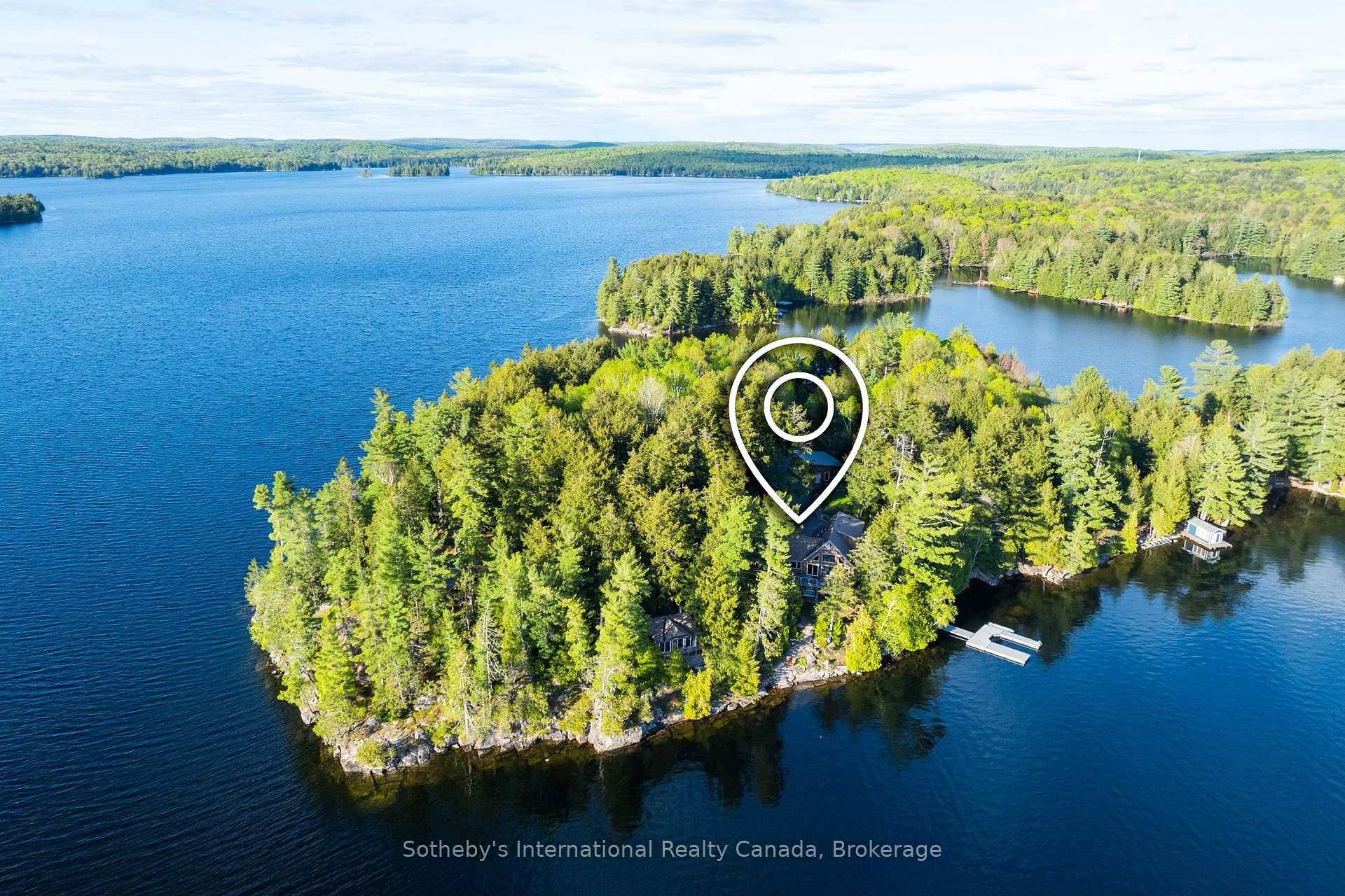 Welcome to West Winds, an exquisite custom crafted timber frame cottage that perfectly blends luxury and natural beauty on the serene shores of Kennisis Lake.