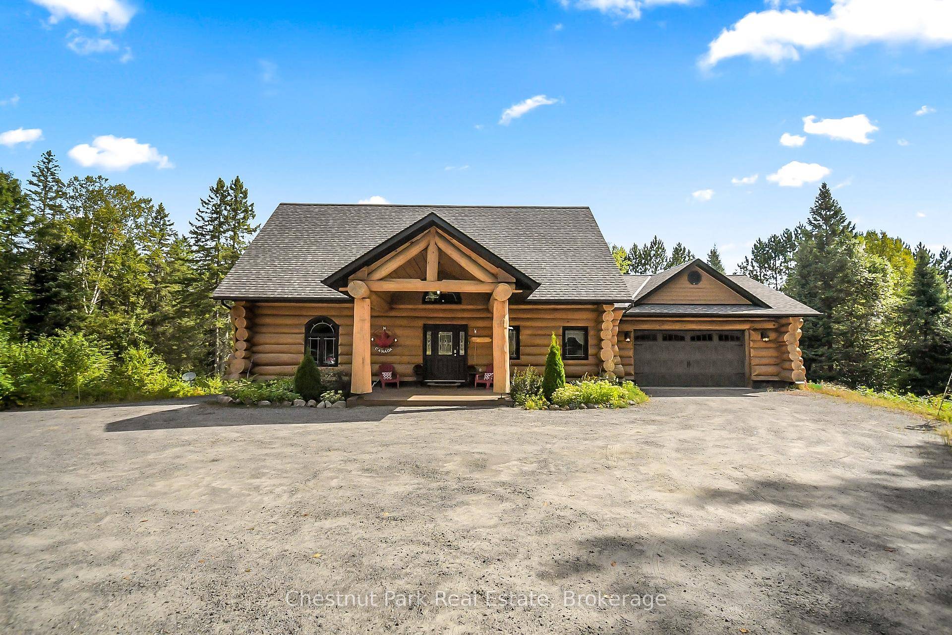 Tucked away on a 2. 5 acre escape, this custom built Scandinavian hand scribe log home welcomes you with its soul soothing blend of rustic elegance and modern comfort.