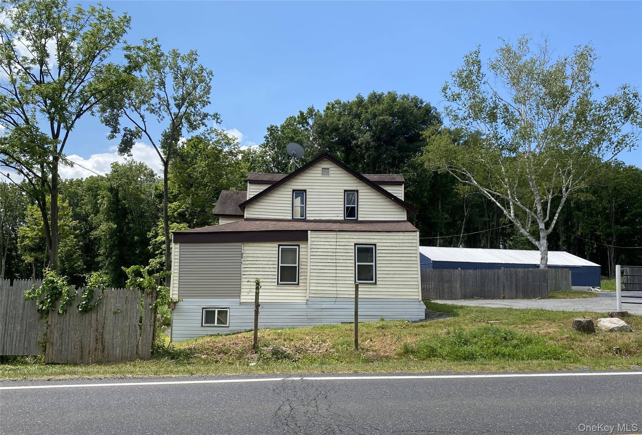Exceptional 11. 9 Acre Development Opportunity in the Heart of Pine Bush Prime Highway Frontage with Water Access and Existing Infrastructure.