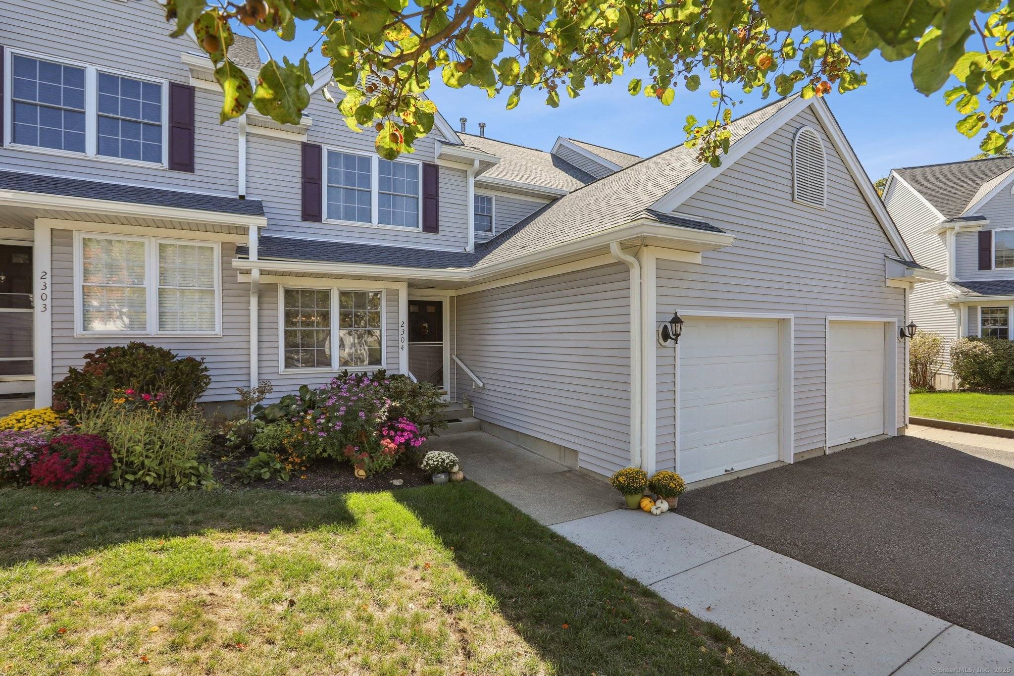 Beautiful Tri Level Townhouse, with 2 bedrooms, 3 1 2 Baths, and a beautifully finished lower level.