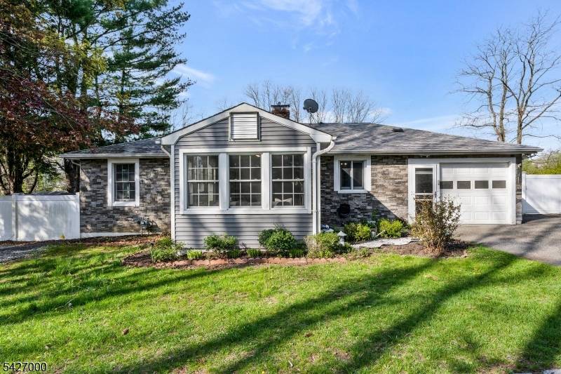 Welcome to 54 Academy Lane, a beautifully renovated 3 bedroom, 3 bath ranch tucked away on a quiet residential private road In the heart of Chester.