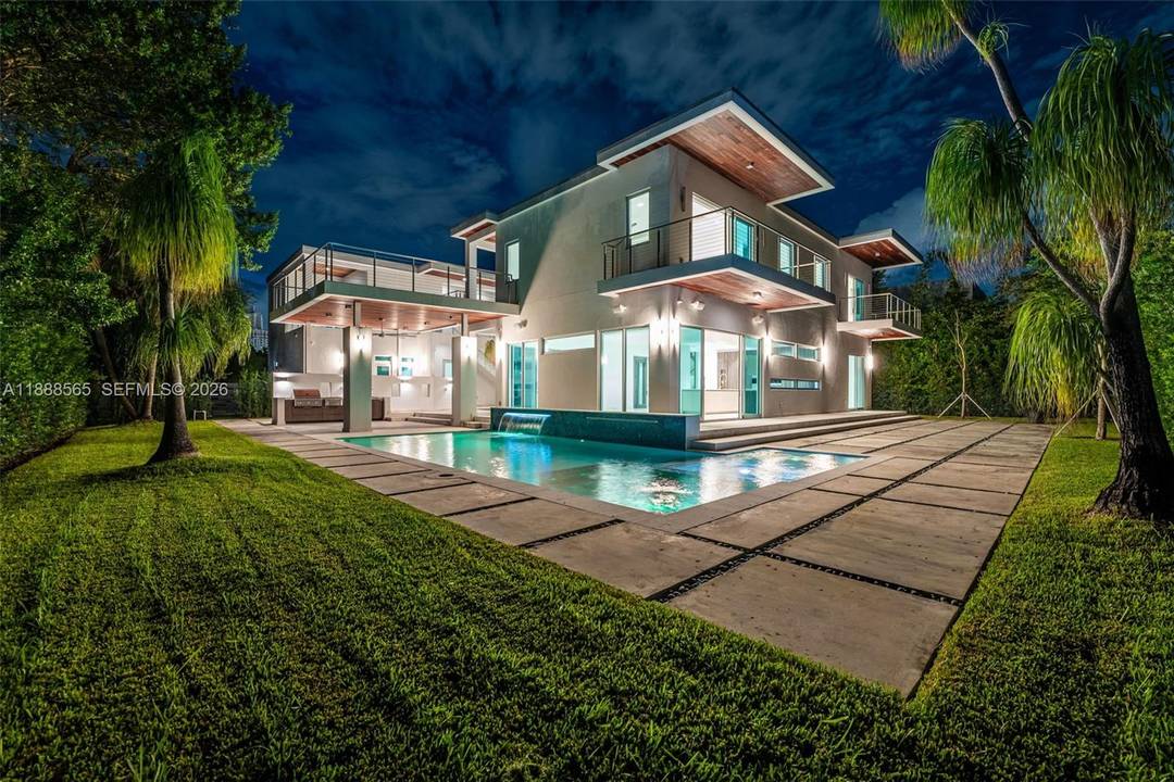 Stunning 6 bed, 6 bath estate with 10 ft ceilings, Italian marble floors, and a chef s kitchen with custom cabinetry, quartz counters, and Sub Zero amp ; Wolf appliances.