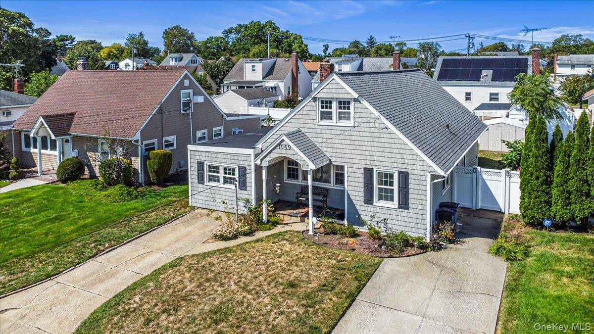 Remodeled cape on beautiful Baldwin Harbor street.