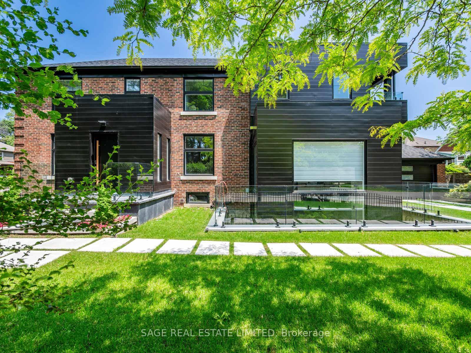Situated on a tree lined street near Mimico Creek, this custom residence in prestigious Sunnylea was designed and built by an architect for his own family.