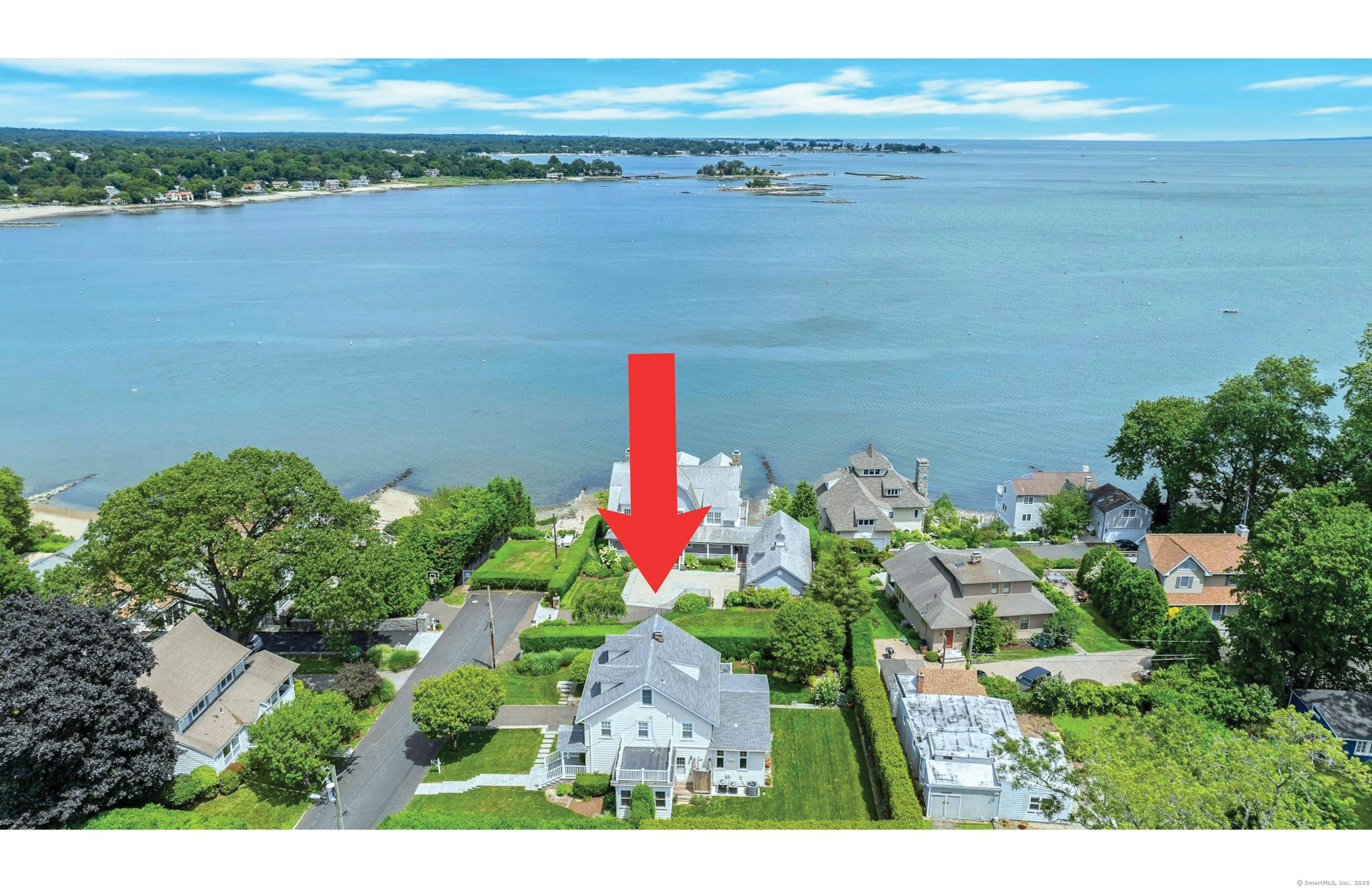 With sparkling water views and a private beach only steps away, this Shippan Point home is coastal living at its best !