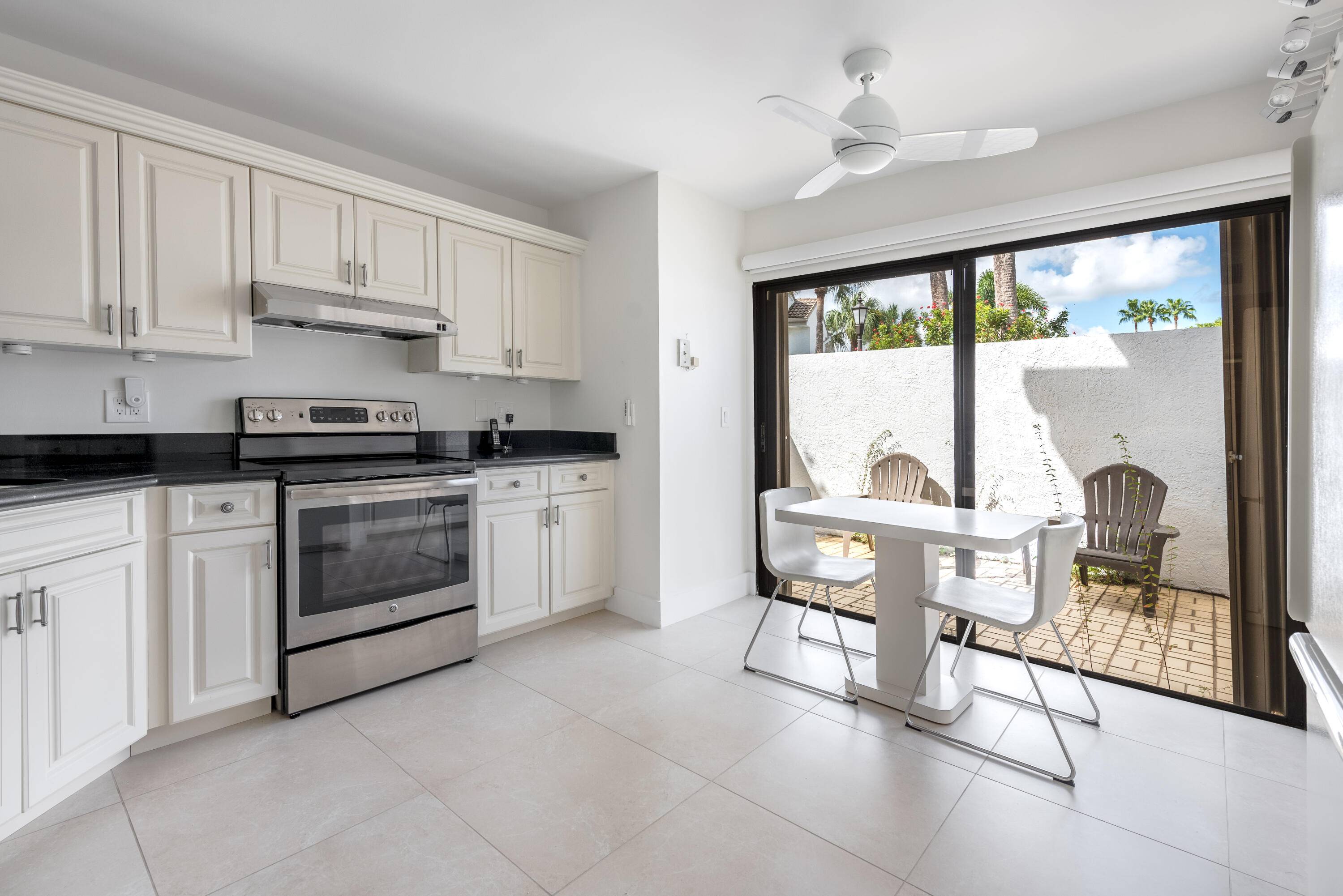 Beautiful first floor unit with golf view and partial lake view.