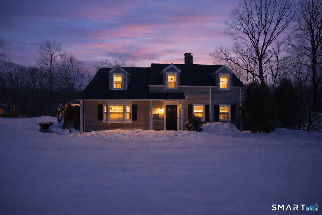 Welcome to this absolutely charming Cape Cod style home, perfectly sited on a picturesque lot w over 2 acres in one of Danbury's most desirable locations.