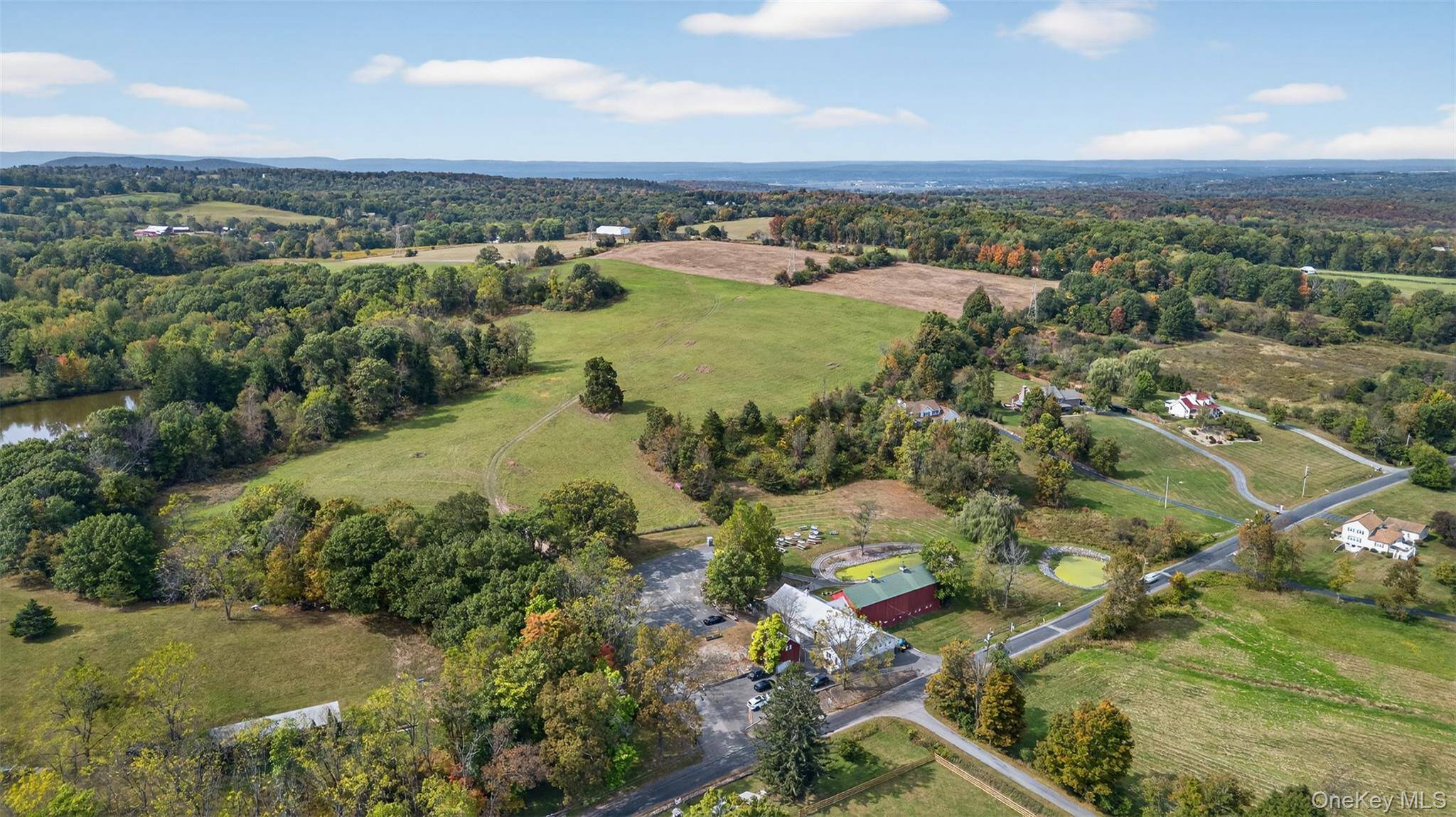 Set on 48. 3 acres in the heart of Warwick s farm country, this extraordinary property blends historic charm, modern amenities, and endless potential.