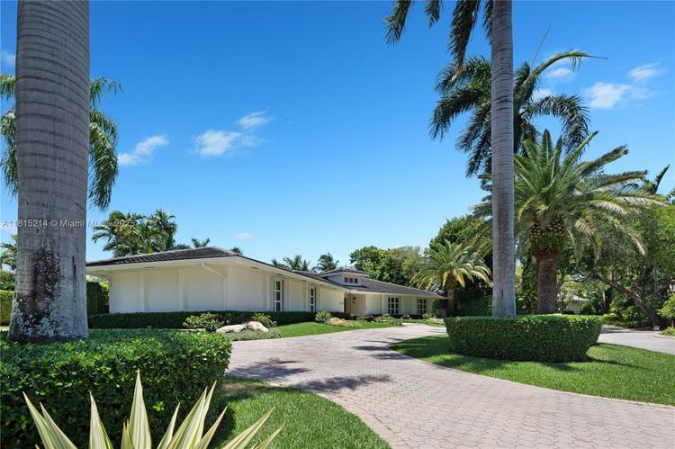 Remarkable waterfront residence in the exclusive, guard gated community of Old Cutler Bay, offering 146 ft.