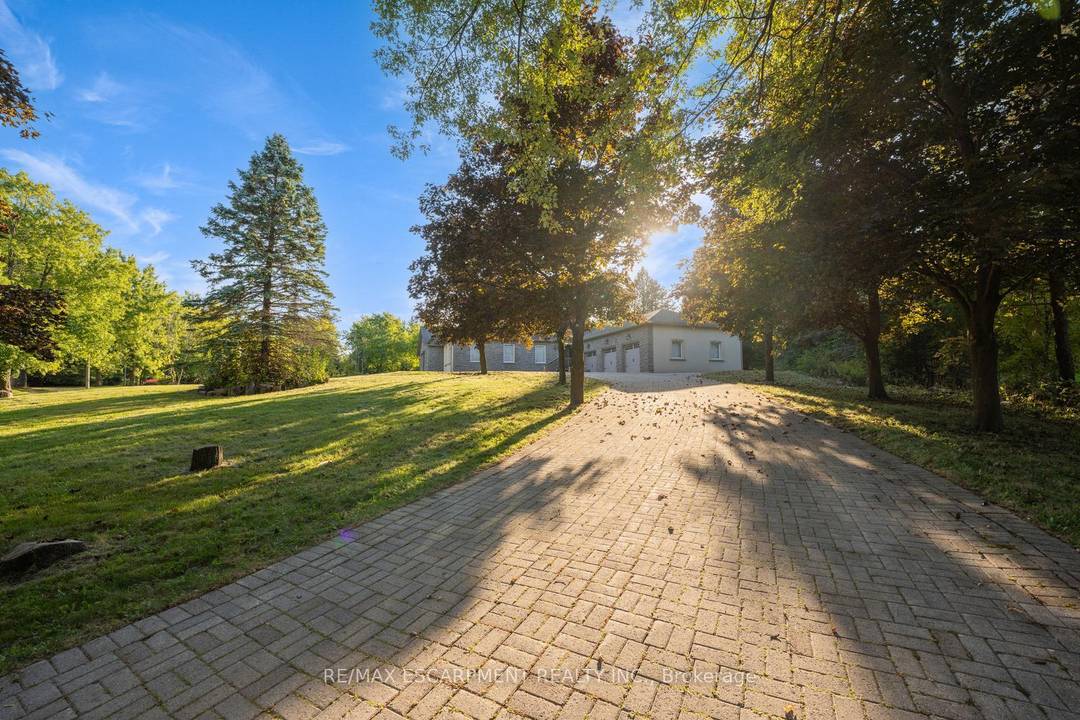 Modern, spacious, and bright 5 1 bedroom, 7 bathroom bungalow nestled on a scenic and private lot.