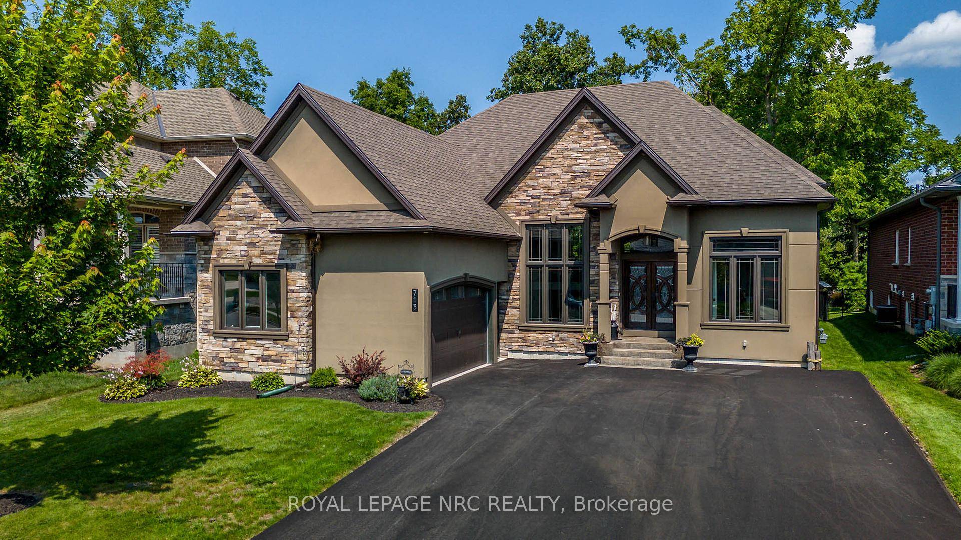 Showstopper ! This 2019 raised bungalow was custom built by the owners with all the high end finishes for their own enjoyment.