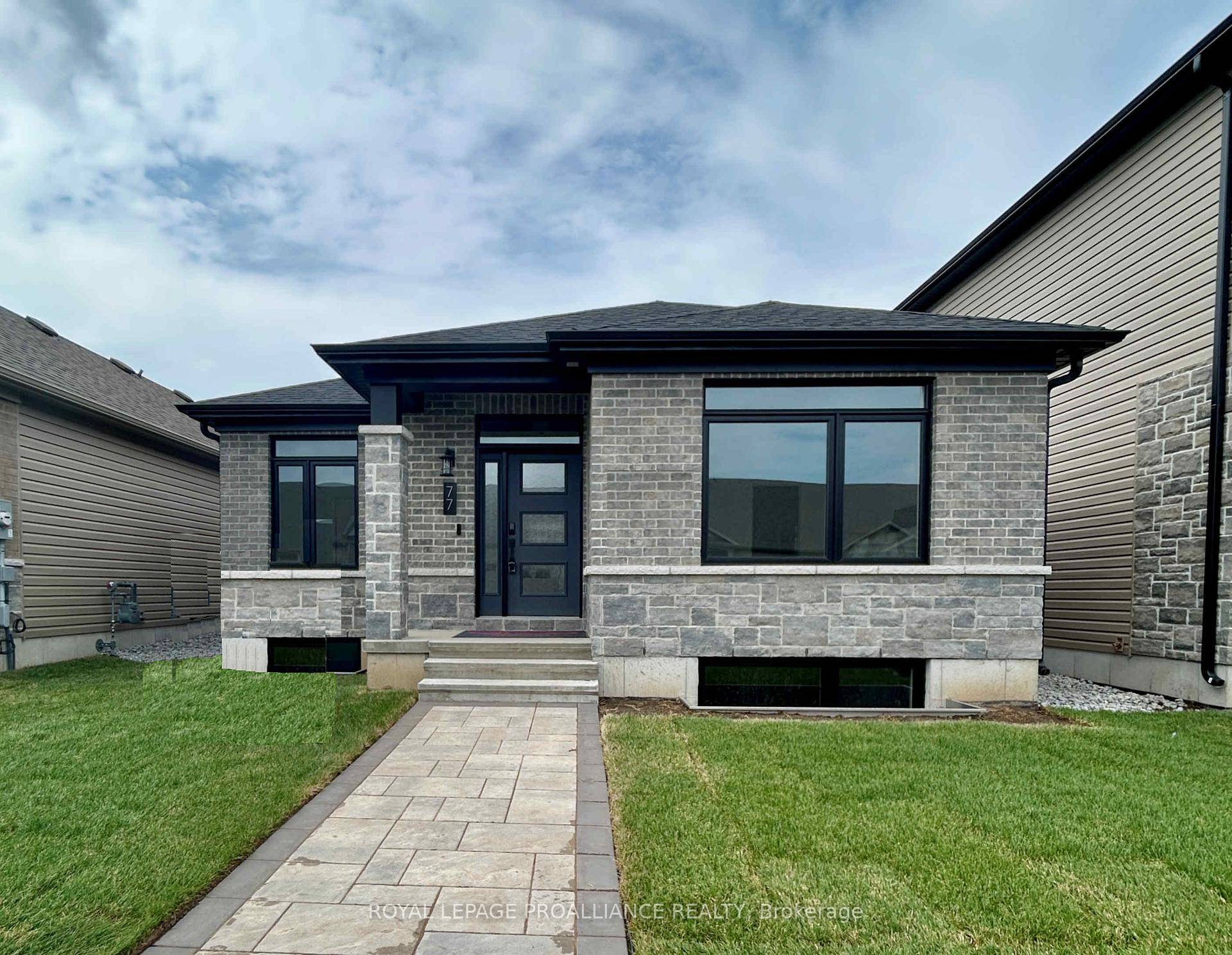 Looking for a fabulous low maintenance bungalow complete with income potential ?