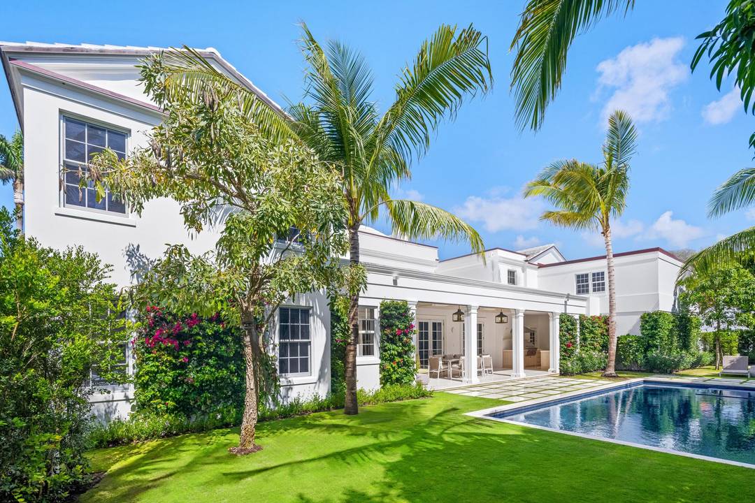 Set on the corner of coveted deeded beach access Eden Road, this exceptional Palm Beach estate offers a rare blend of historic pedigree, modern sophistication, and serene coastal living.