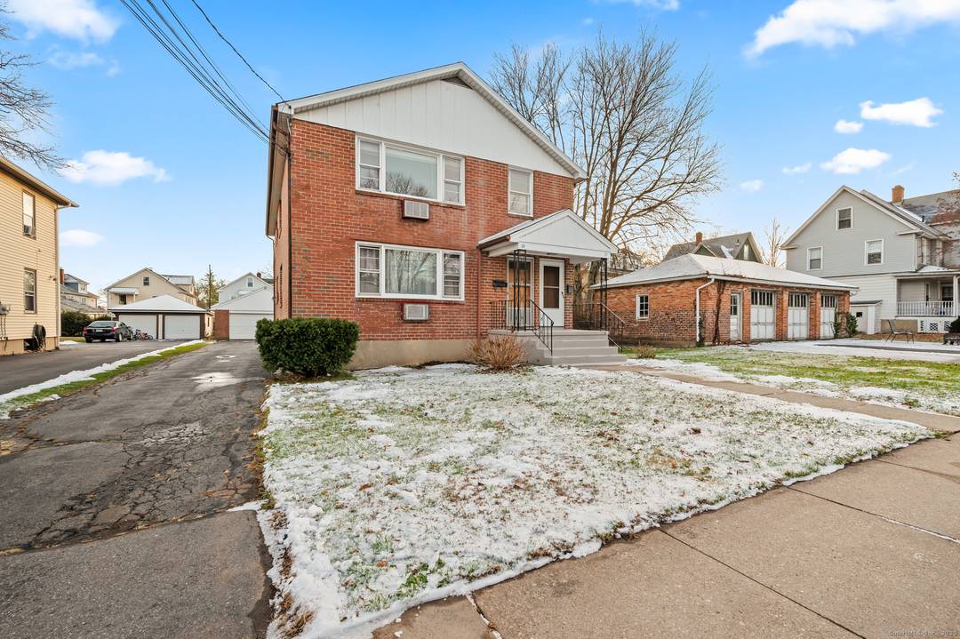 Here is your opportunity to own an income producing, charming brick, multi family on a quiet street in West Hartford !