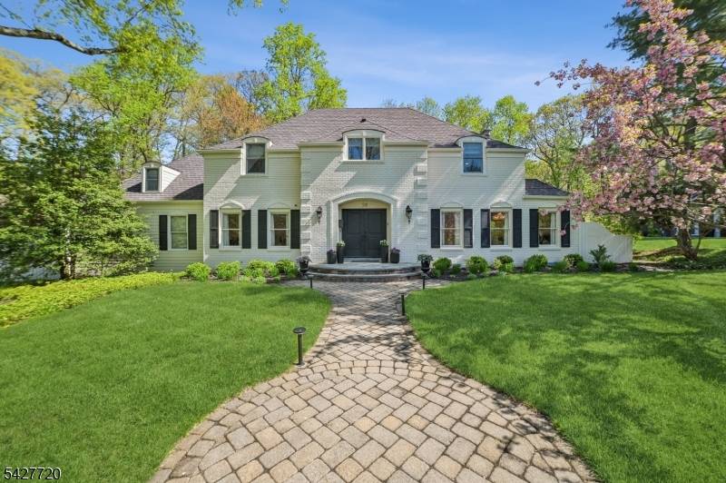 MAGNIFICENT FRENCH COLONIAL SHORT HILLS CUL DE SAC Nestled in one of Short Hills' most prestigious enclaves, this stunning French Colonial was meticulously reimagined renovated from top to bottom in ...