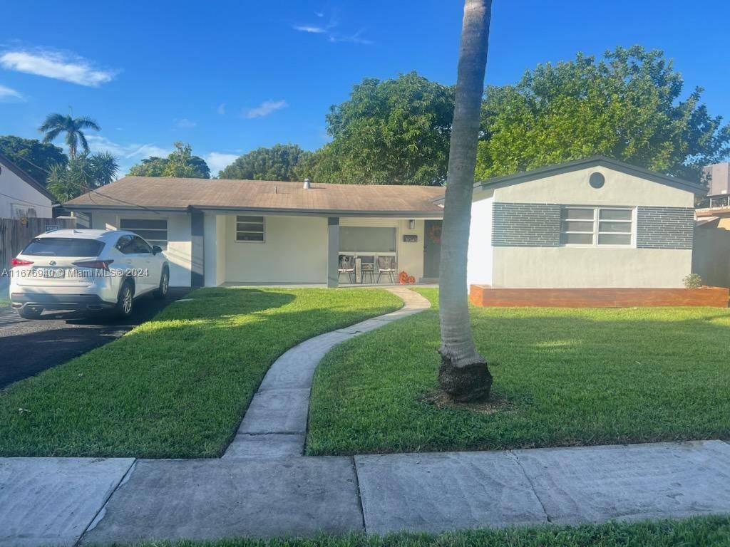 Discover paradise living in this meticulously renovated 3 2 single family oasis nestled in Hollywood's sought after Lakeview Estates !
