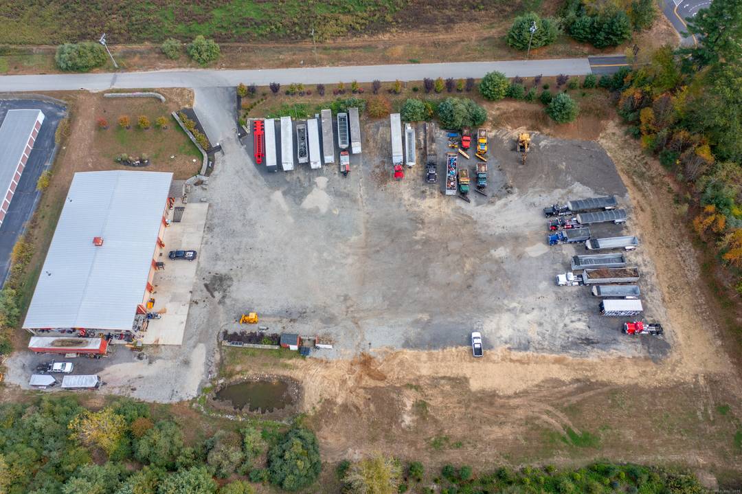 Strategically positioned along the I 395 corridor, this 11, 500 SF steel building in Pomfret was built in 2020 and purpose designed for trucking operations.