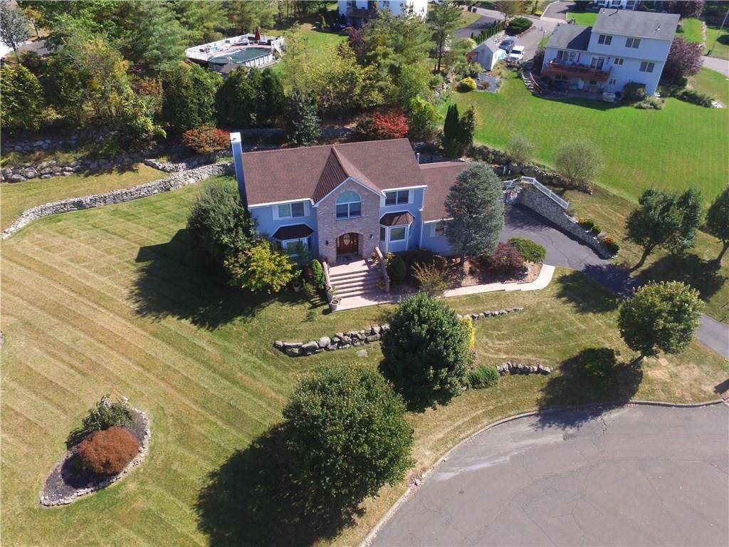 Welcome to this stunning 5 bedroom, 4 bathroom dream home, perfectly nestled on a quiet cul de sac with exceptional curb appeal and beautifully landscaped grounds.
