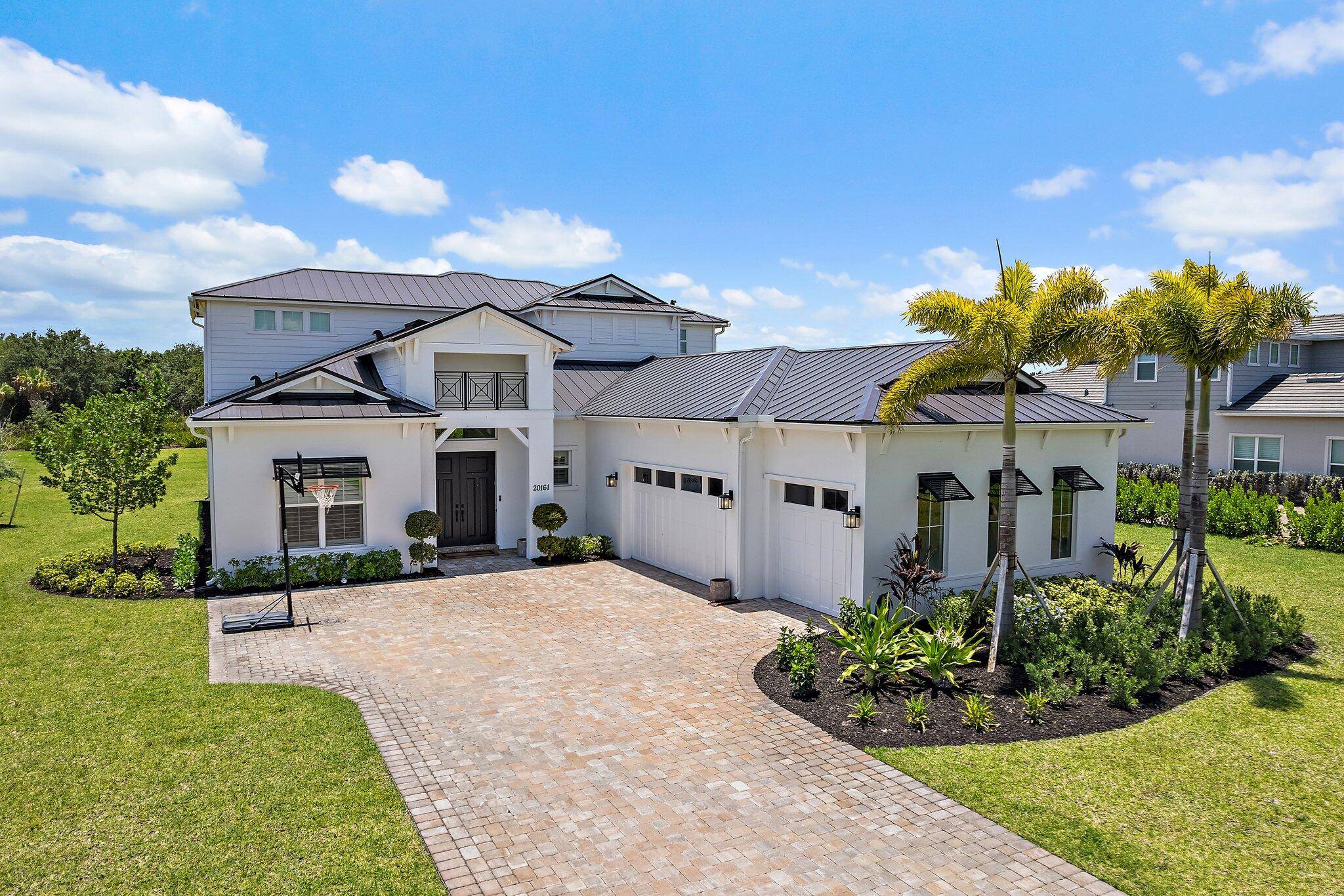 Experience elevated living in one of Jupiter's most exclusive gated communities Bridgewater by DiVosta.