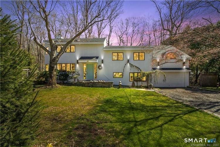 Welcome to your own private oasis, tucked away on a quiet cul de sac in Norwalk !