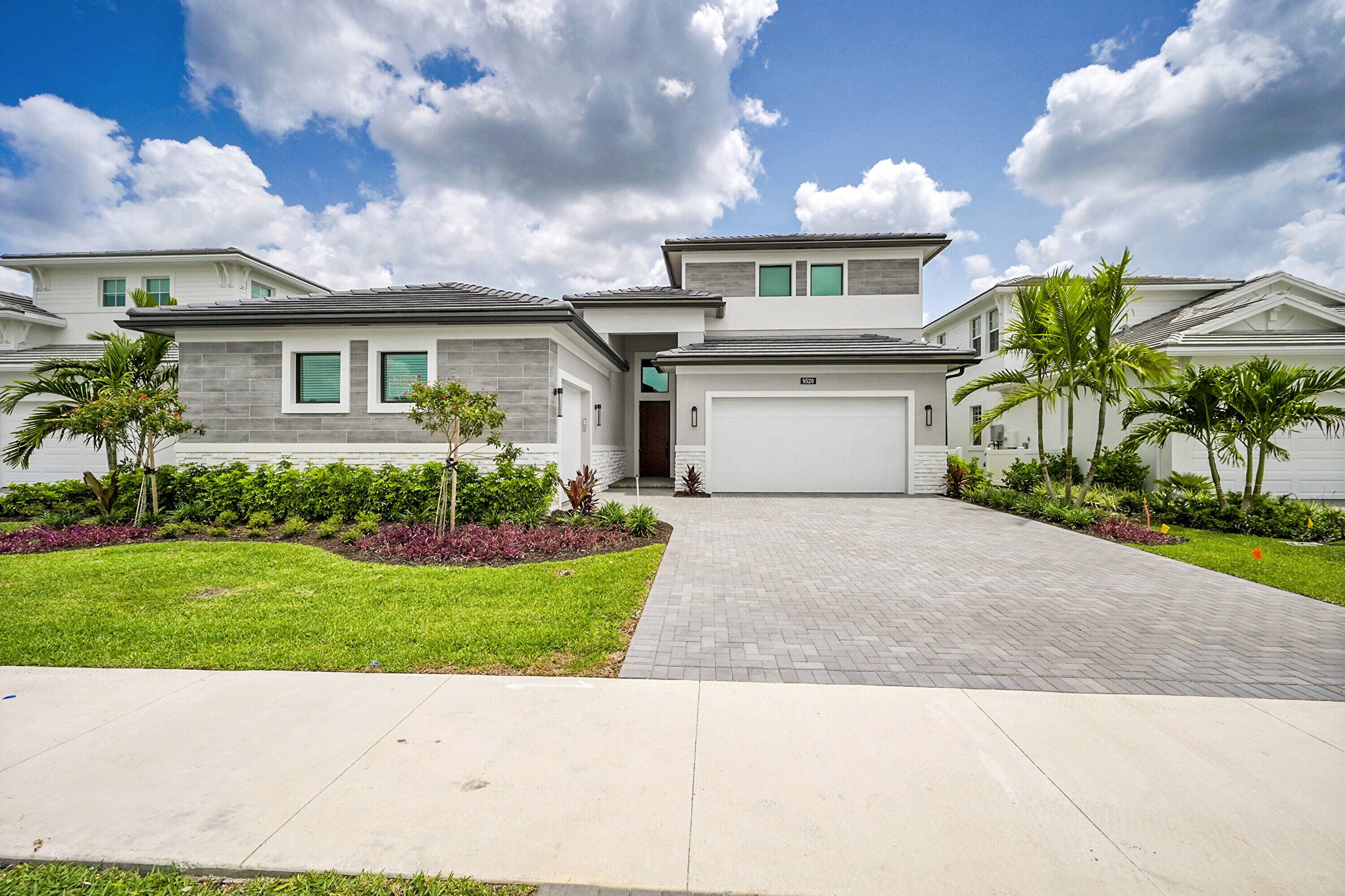 This brand new Sydney floorplan, built by Kolter Homes, is located within the gated community of L'Ambiance at Avenir.