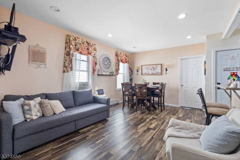 Two Family house for sale with finished attic and finished basement !