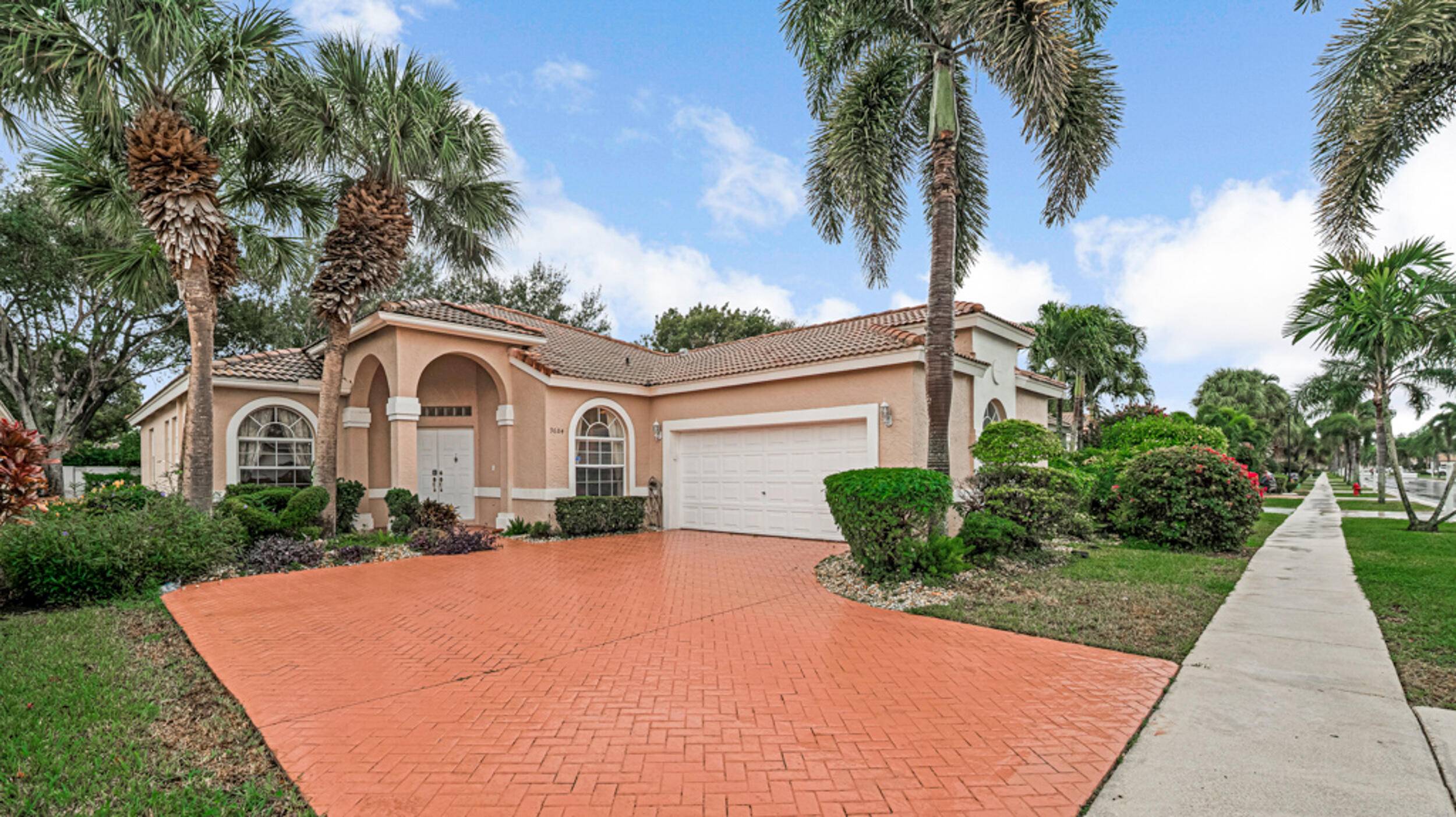 This home is a rarely offered model in Palm Isles.