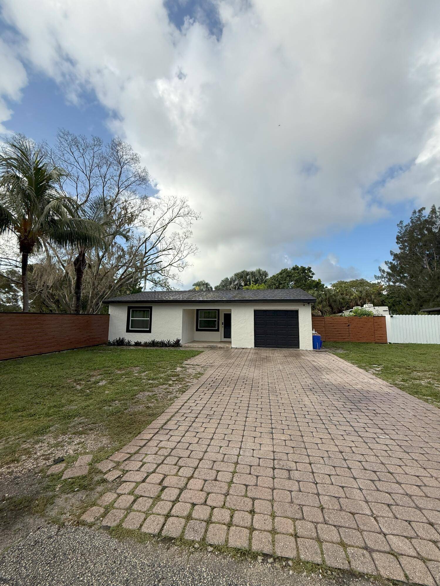 Fully Renovated 2025 Roof Impact Windows, Doors Garage Huge Yard Quiet Dead End StreetBeautifully renovated and move in ready !