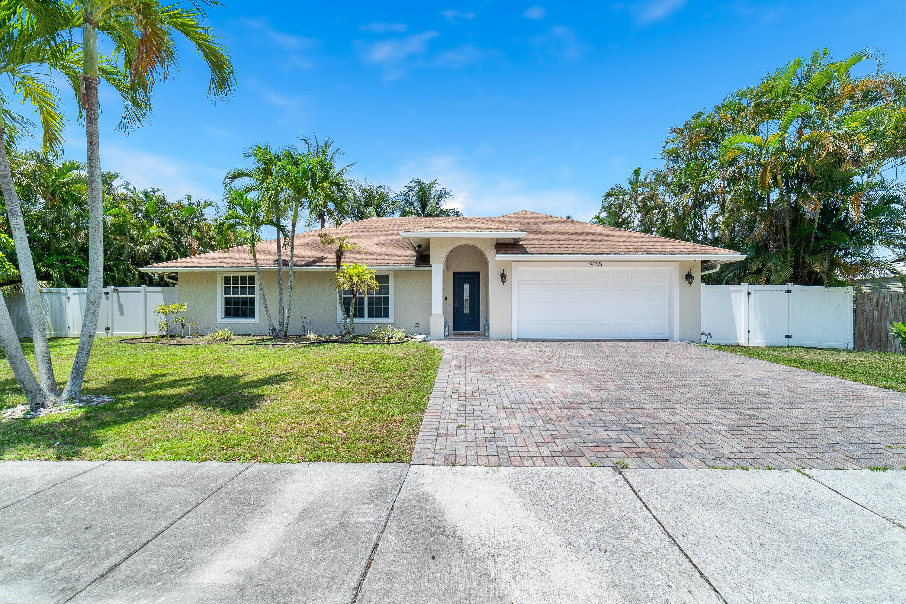 This spacious and well maintained 4 bed, 2 bath home on a.