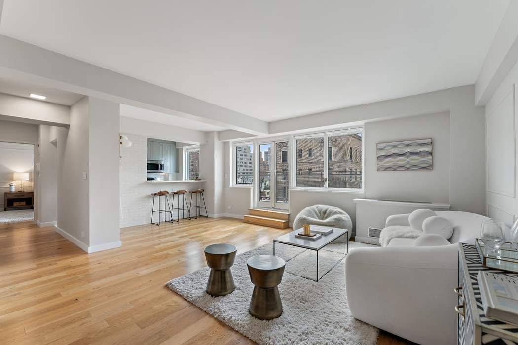 Welcome to this exquisite and light filled two bedroom, two bathroom residence, ideally located on the corner of Madison Avenue and 68th Street.