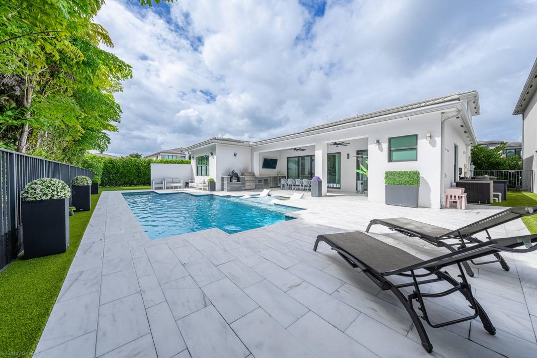 Fantastic two story pool home in the prestigious Lotus community.