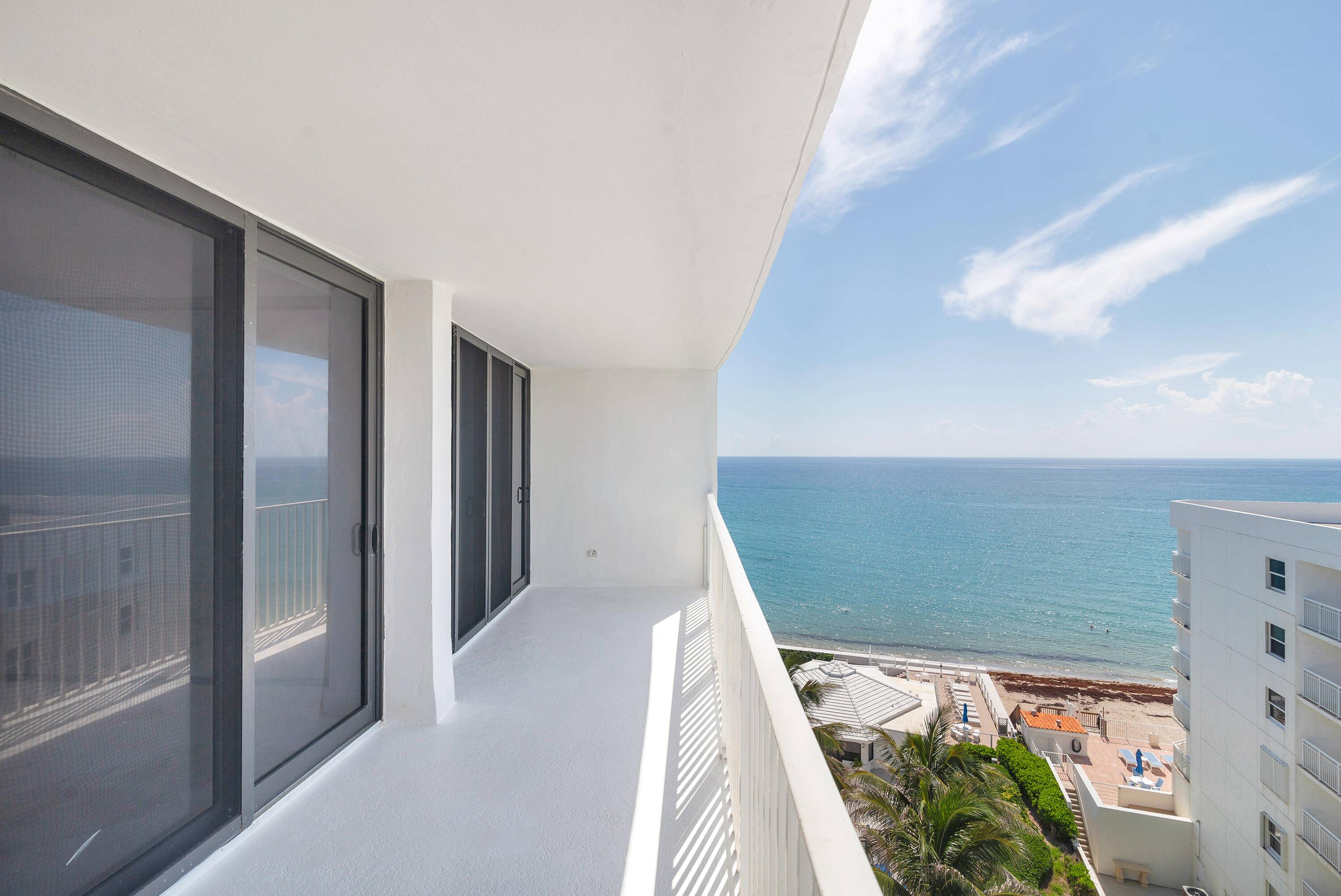 A rare opportunity to own a top floor, fully renovated penthouse directly on the ocean in South Palm Beach.