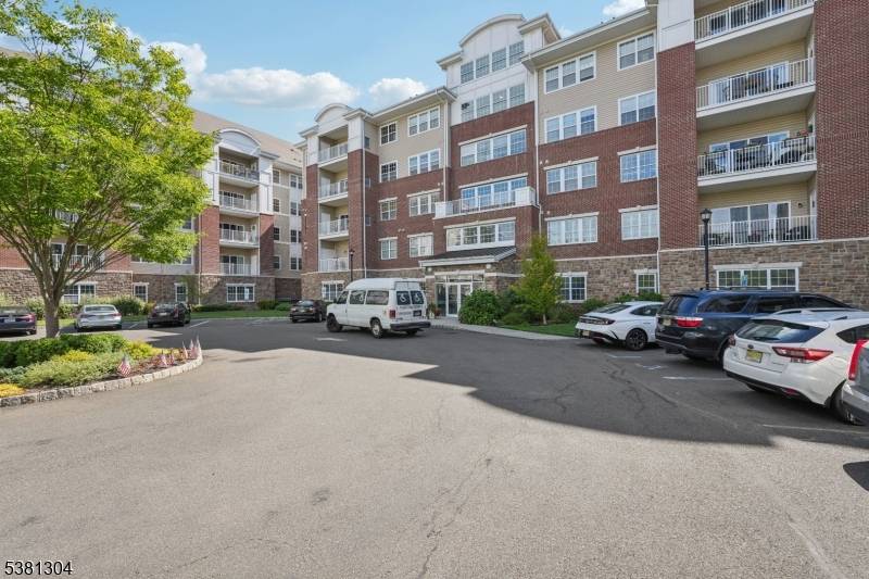 Welcome to this beautiful Colfax END UNIT condo in the highly desirable Wanaque Reserve, an active adult 55 community.