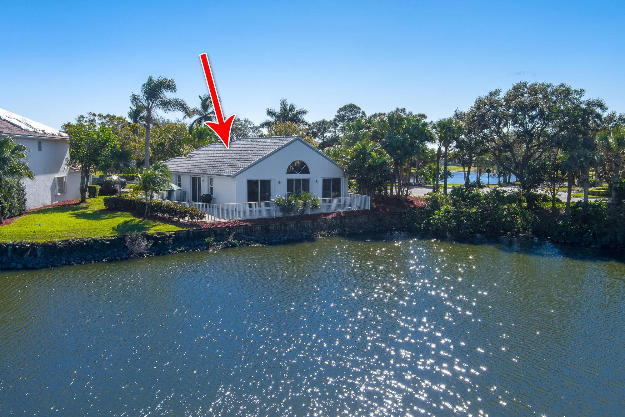 Breathtaking Lake Golf Views in the desirable gated community of Ballantrae with Jack Nicklaus Signature Golf Course and a 67 slip Marina.