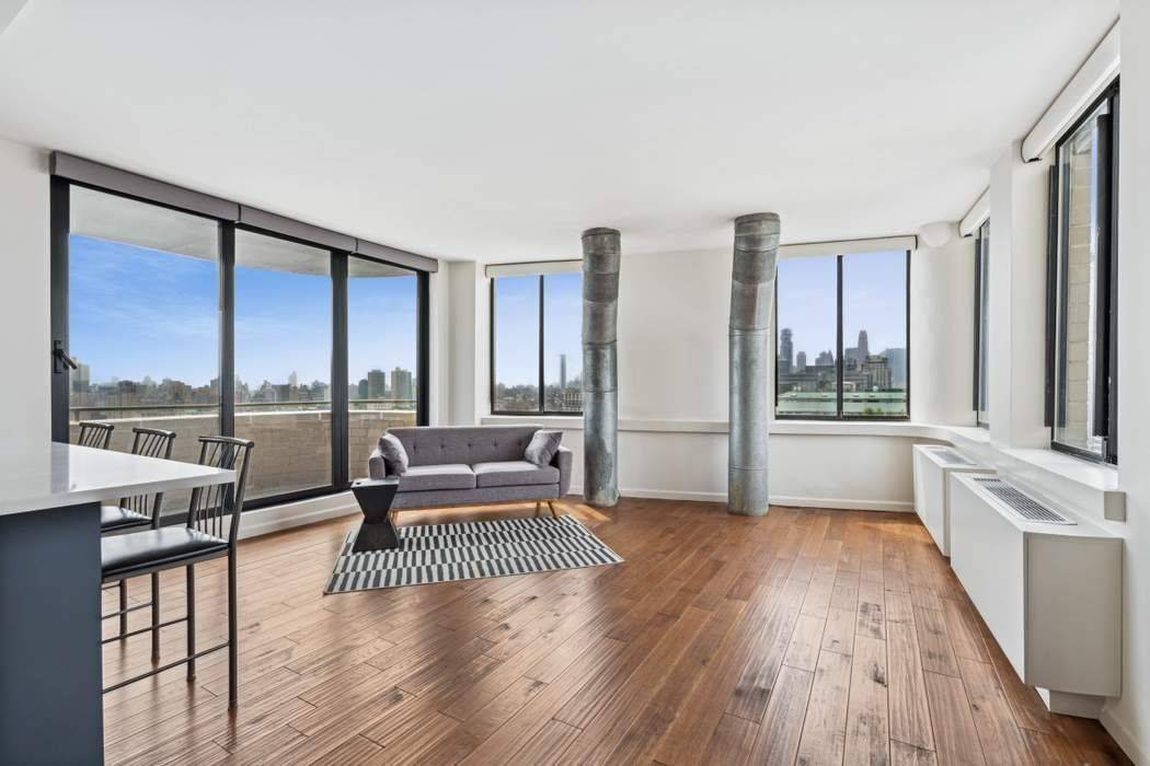 Welcome to 22D at The Memphis Downtown a high floor West Village home with sweeping views of the Statue of Liberty, Hudson River, and downtown skyline from both the window ...