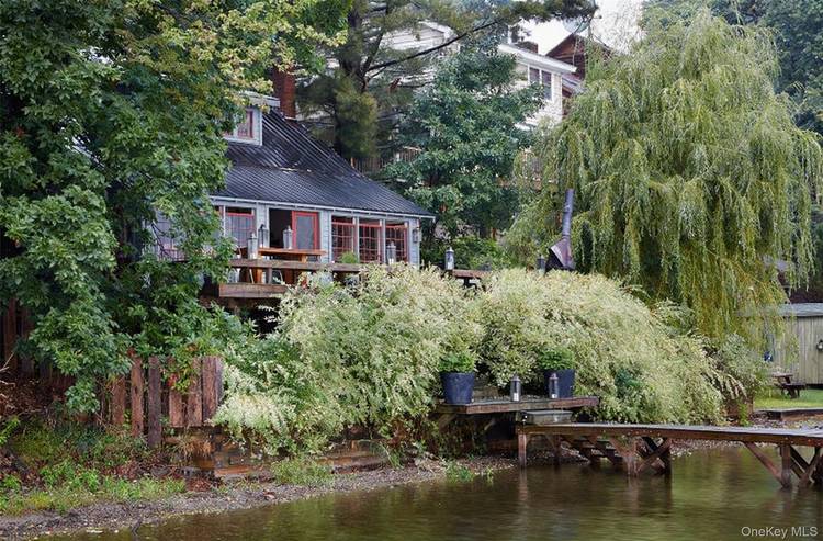 Set directly on the shores of Copake Lake, this character filled lake house offers a rare opportunity to experience one of the Hudson Valley's most beloved waterfront communities through every ...