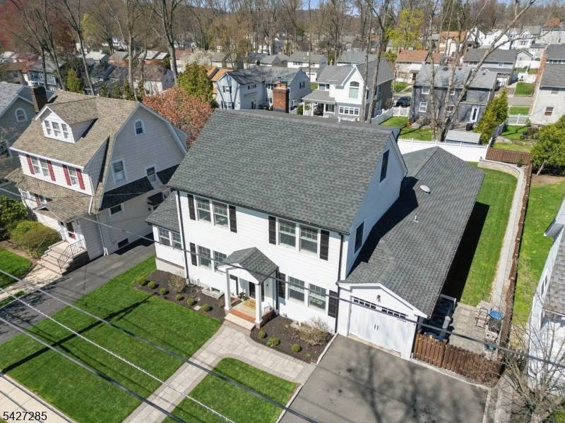 Welcome to this fully re imagined Verona Center Hall Colonial, set on one of Verona's most coveted streets just steps from top rated schools.