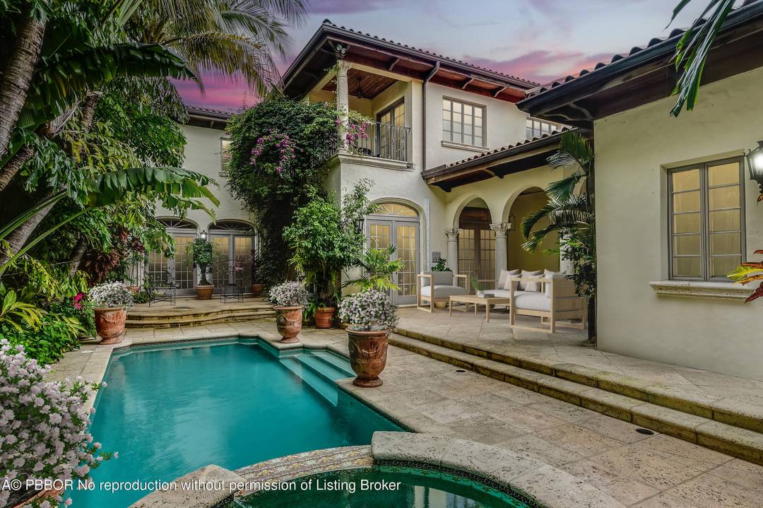 Spacious Mediterranean Townhouse in a most desirable location deep lot 171 feet provide max privacy on the highly coveted Lake block of Brazilian Avenue.