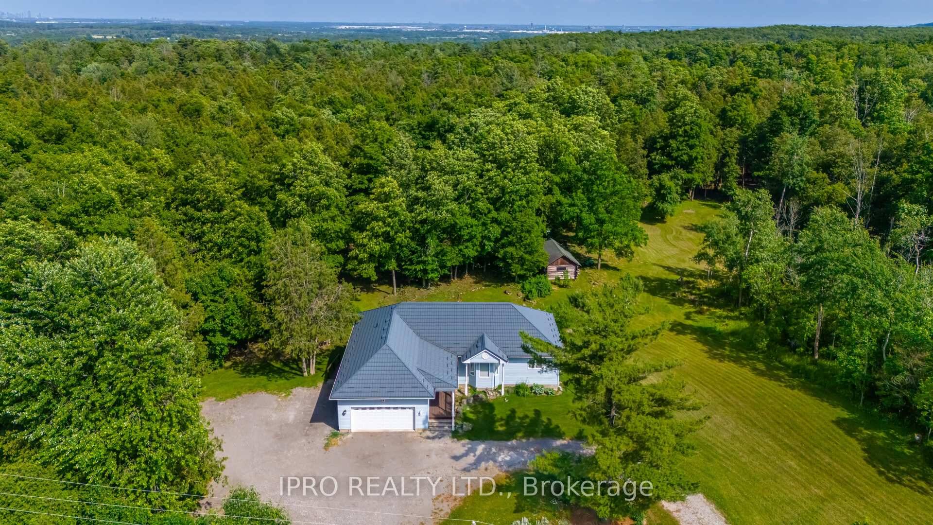 This versatile bungalow on a scenic 7 acre property is perfect for investors or a multi family living.