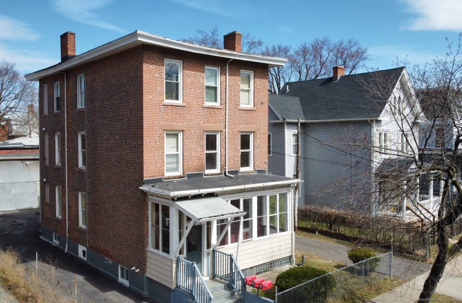 This property offers 3 fully renovated residential units and a commercial style 2 story, heated structure at the back.