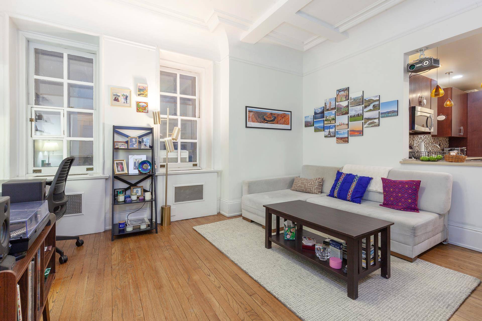 This beautiful 733 square foot condominium perfectly blends classic charm and modern convenience.