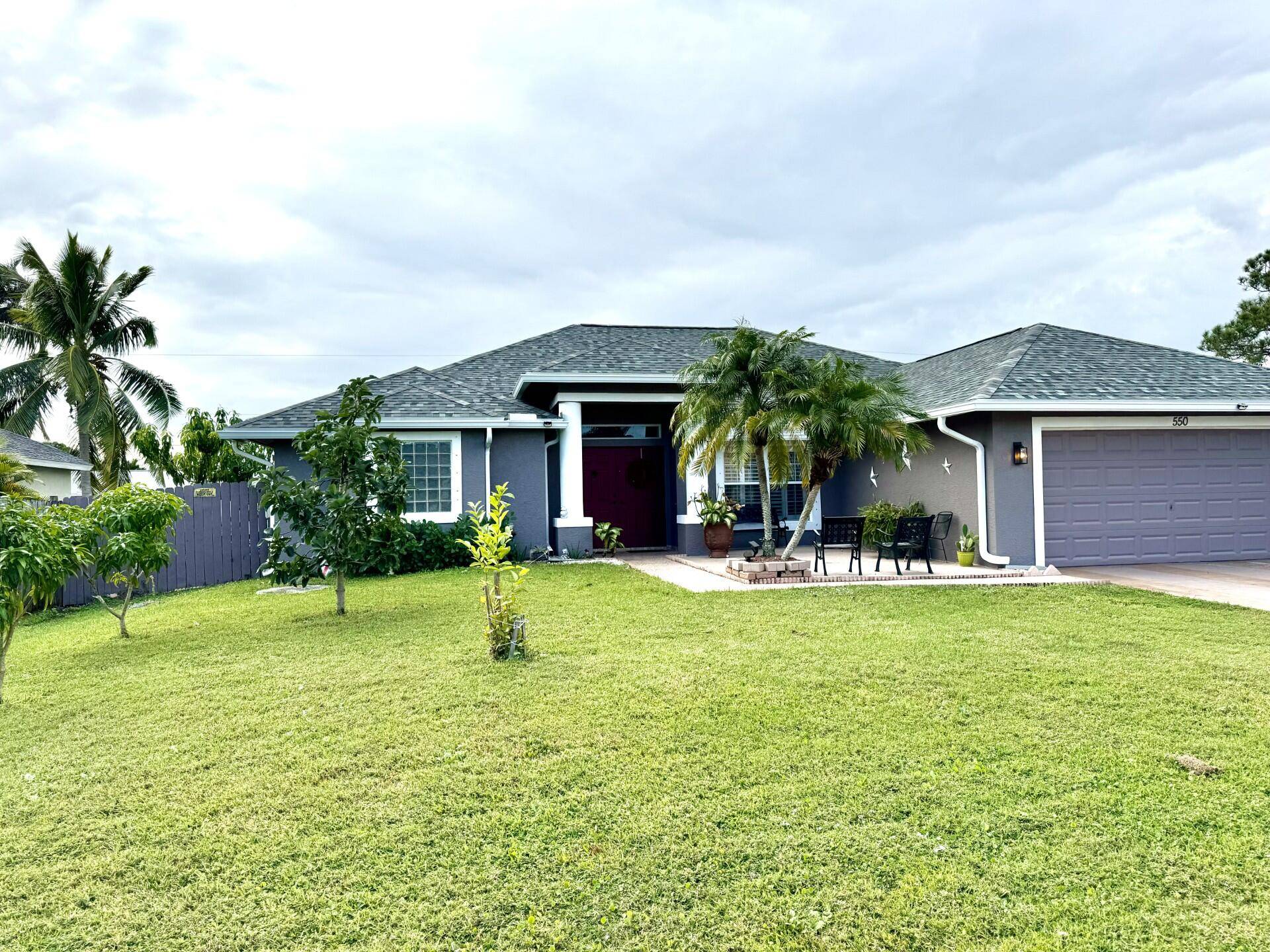 Beautiful house for sale 4 2 2 completely renovated with an open floor plan featuring a formal living room, dining room, breakfast area, family room, and kitchen.