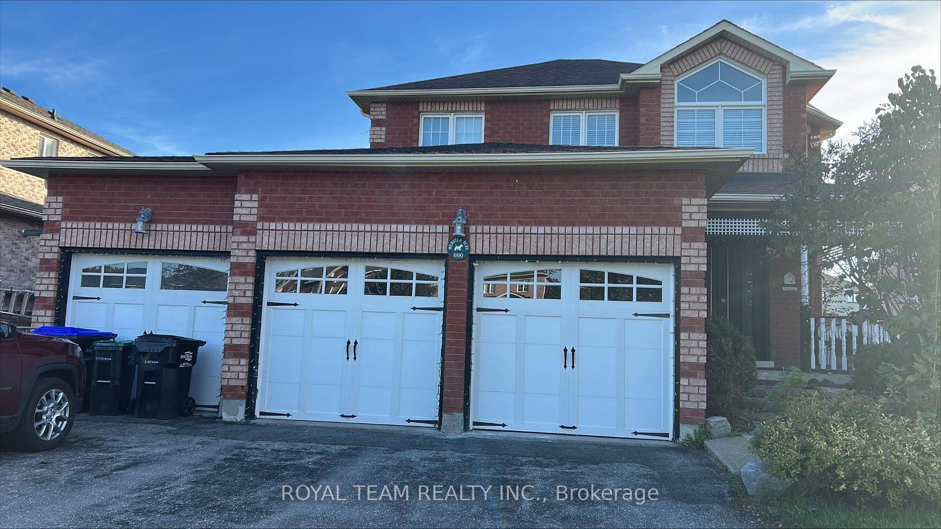 Rear Opportunity to Lease the Renovated Lindenhurst Model, All Brick w Triple Car Garage, excluding one space.