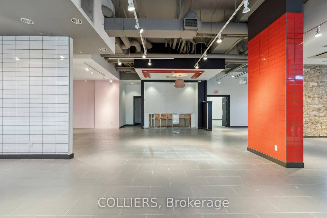 High exposure corner retail unit available nearby to Queen and Woodbine, offering exceptional visibility in a bustling, high traffic area.