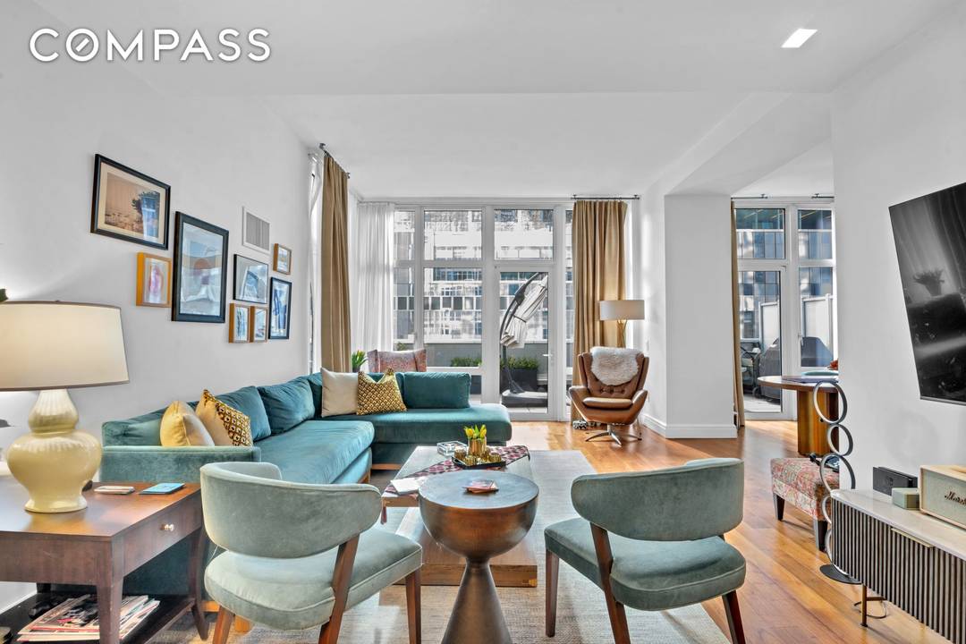 Stunning mint condition townhouse style duplex glamorously set within the amenities of a luxury condominium tower.